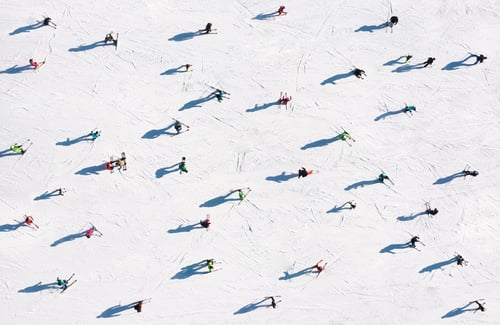 Aerial photo of skiers on a snowy slope